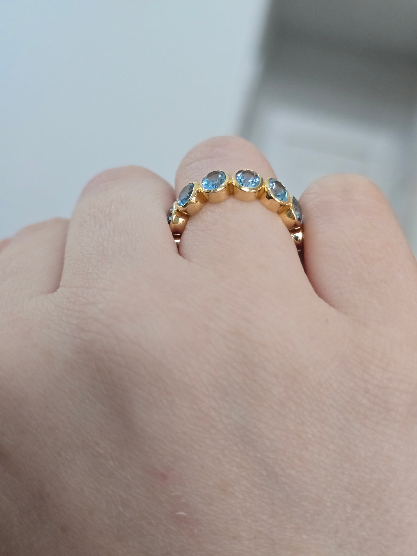 18k Yellow Gold Blue Topaz Eternity Band