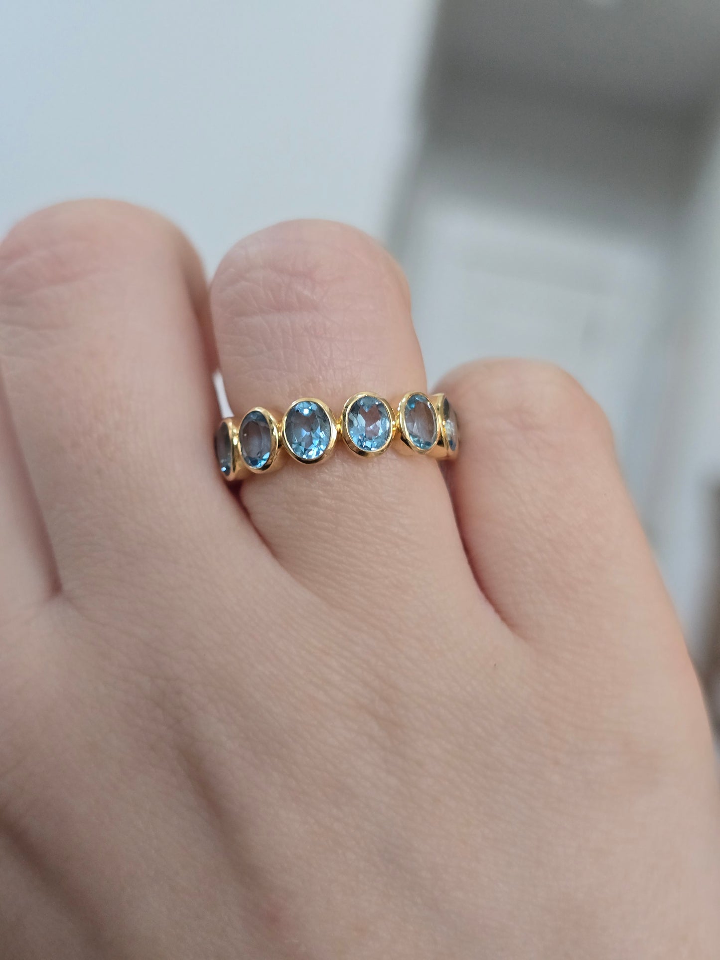 18k Yellow Gold Blue Topaz Eternity Band